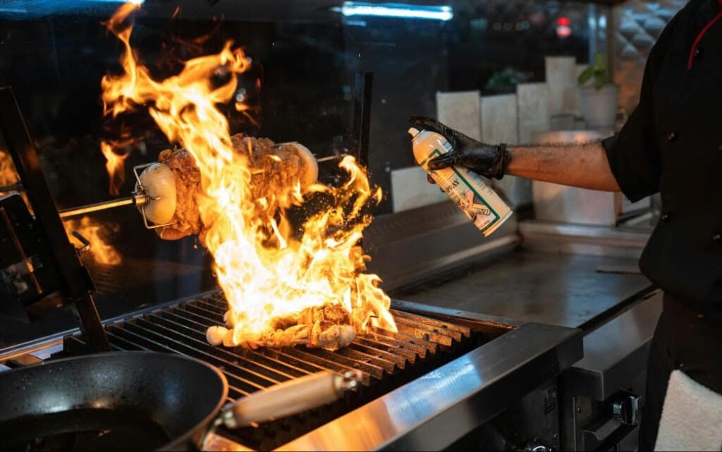 A bustling eatery kitchen displaying different business cooking hardware